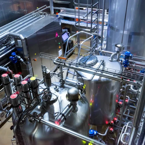 metal-reservoirs-at-a-soft-drink-factory-2024-10-18-05-17-26-utc-scaled